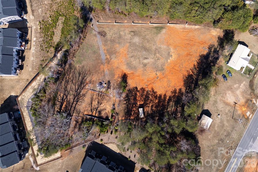 Prime 2.1-acre development opportunity in Fort Mill’s high-growth corridor, minutes from Hwy 160 and I-77.
Property is already zoned RDU, significantly reducing the development risk. Site includes well in place and has access to city water and sewer and tap fees have been paid — lowering upfront infrastructure costs. Strategically positioned near major transportation arteries with continued residential and commercial expansion in the surrounding area. Rare opportunity to secure entitled land under $650K in one of the Charlotte metro’s fastest-growing submarkets. Good fit for small–mid developers, boutique multifamily builders, single family home-built, mixed-use investors, 1031 buyers seeking entitled land.
More Pictures coming soon.