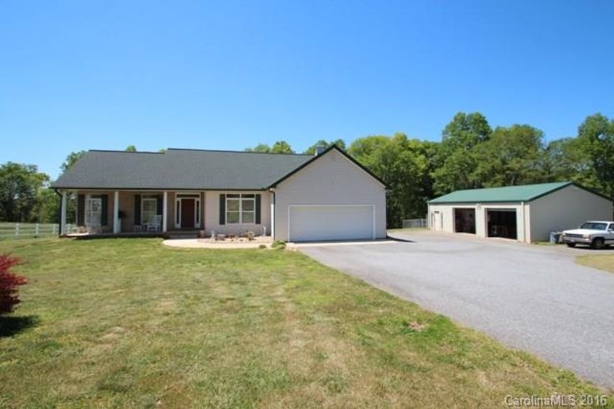 Spacious home on 5.49 Acres just outside city limits. Home features a full finished basement w/rec room (2nd FR), Playroom, Storage, BR & full bath. Oversized owners retreat w/WIC, spacious bath w/separate tub & shower. Chefs kitchen w/SS appliances. There is a detached heated & cooled shop w/2 car garage, air compressor, office & half bath. Tractor shed. Property goes to the river in back.