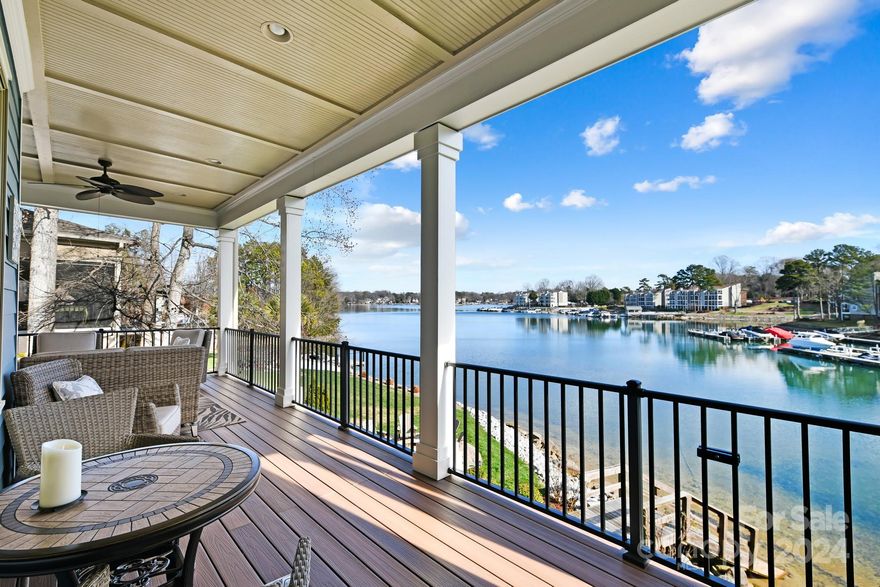 Welcome to this gorgeous home located in the waterfront, gated neighborhood of Pointe Regatta.   This waterfront custom home features stunning views throughout.   Owners have made significant updates, including a full kitchen and primary bathroom remodel, interior and exterior paint, complete gutter replacement, new HVAC (3 zones, 2 new), all new hardwood floors on the main level, and a new deck.   Plus, landscaping updates in both the front and back yard.  The kitchen is equipped with Wolf and SubZero appliances. Ample storage is available throughout the kitchen, including additional storage in the island. The primary bedroom suite includes heated floors in the bathroom and a modern design.   Home includes an assigned boat slip a short walk away with a new hydrolift.  The property also features an invisible fence and a termite bond.  Don't miss the half bath with exterior access on the lower level, plus extra storage for your toys!  Car enthusiasts will love the oversized garage!