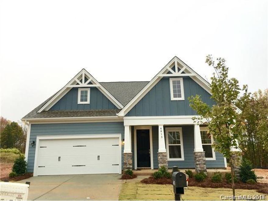 Beautiful home with open floorplan. Wood floors throughout main living areas and in the luxurious Master Suite. Well-appointed Kitchen with gas cooktop, granite counters and spacious island. Guest Bedroom and a full bath on main level. Computer area on 2nd floor. Ceiling fans with light fixtures in every bedroom and main living areas. Wired for cable/internet. Great community with pool, trails, and more. A fantastic opportunity!