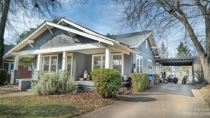 Location. Location. Location. Classic 1914 bungalow close to the heart of Downtown Morganton. Relax on the traditional front porch and enter the home through the original front door to the living room and dining room with 9-foot ceilings and lots of windows. Beyond is the classic center hall design with kitchen(also swinging door from dining), two bedrooms, office/4th bedroom, and bath with clawfoot tub. A later addition includes a primary bedroom, bath, and large closet. Many original details remain including glass front door, turn doorbell, many glass doorknobs, bead-board walls and ceilings, refinished hardwood floors in many areas, clawfoot bathtub, 9-foot ceilings in the original house, and more. Owners have started some cosmetic renovations by removing tiles and panels to expose original bead-board ceilings and walls. Leave the original character or finish with colors and details you want. Make this classic your own.