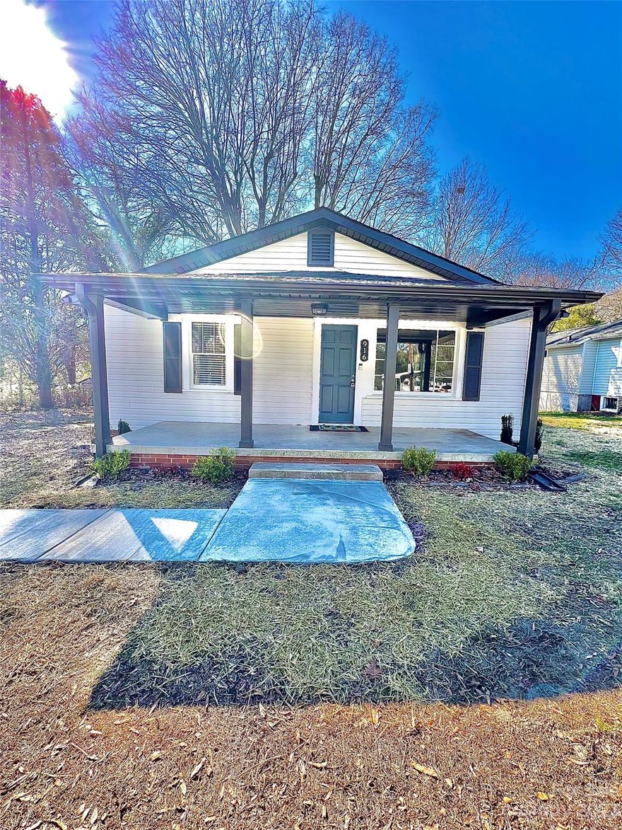 Charming 2 bedroom, 1 bath home with an open floor plan just minutes from the newly revitalized Downtown Kannapolis, I-85, and more. Completely remodeled with gorgeous hardwood floors throughout, beautiful kitchen with a picture window over the sink, a classy backsplash, and elegant butcher block countertops paired with stainless steel appliances. Some of the recent updates such as new doors, HVAC, electrical, plumbing, cabinets, ensure a modern and efficient living experience. Beyond the interior, a generous private yard awaits, accompanied by a welcoming deck, perfect for enjoying the great outdoors. Brand new walking path to the front porch.  This home is a perfect blend of comfort and style, to create lasting memories for years to come.  **Owner is a licensed NC broker.