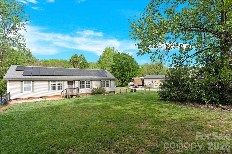 This 3 bed/2 bath home is situated on a large, nearly 1 acre lot just outside of Mount Holly. The property features an above ground pool and private backyard surrounded by trees, along with a detached garage and multiple storage sheds offering plenty of space for hobbies, tools or additional storage needs. The fenced in front yard is perfect for pets or outdoor entertainment. Conveniently located near Mountainview Driving Range and South Fork River Park, this home provides convenience and easy access to recreation while still maintaining a peaceful and private setting.