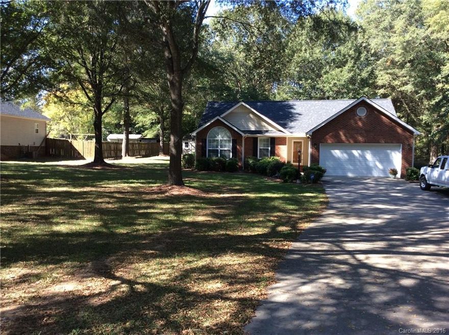 Come see this well taken care of home on a half acre.  Seller just had new flooring installed in the kitchen and hall bathroom. Roof is only 2-3 years old. HVAC unit is about 5 years old. Water heater is a couple years old. This home is certainly worth the time to see. Nice deck off the back of home.