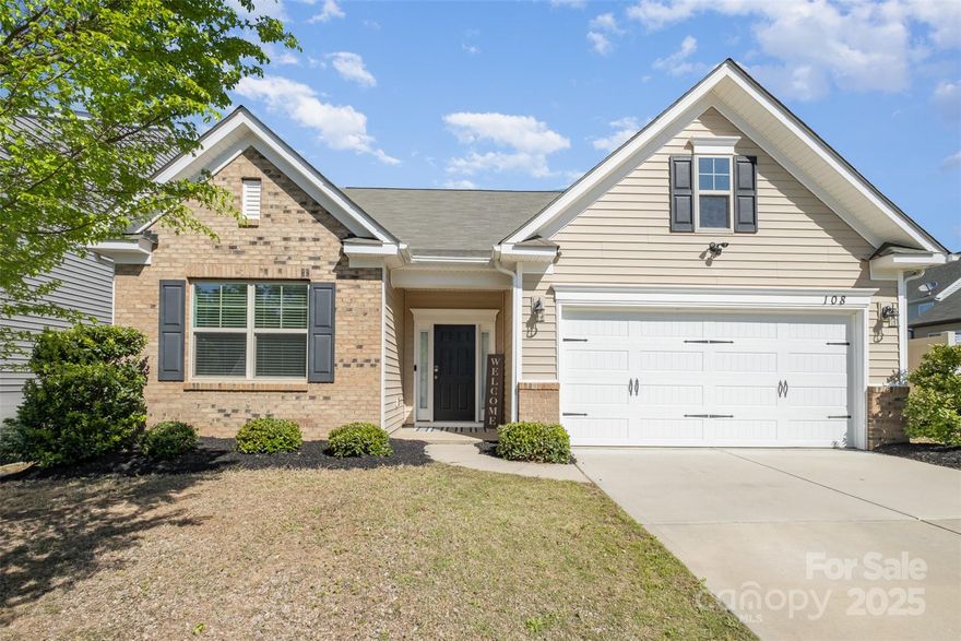 This charming ranch could be your dream home! Just 5 minutes from historic downtown Mooresville, where dining, parks, galleries, shops, and small-town charm await. Step into a spacious foyer that opens to a bright, airy layout with enhanced vinyl plank flooring and crown molding throughout. The great room is filled with natural light from a wall of windows and flows seamlessly into the kitchen, which features white staggered cabinetry, granite counters, pantry storage, a large island, and a 5-burner gas range—perfect for cooking and entertaining. The generous primary suite includes double vanities, a tiled shower, and a huge walk-in closet with pass-through to the laundry. Enjoy peaceful mornings or relaxing evenings on the covered patio overlooking a private, fully fenced backyard. Smart home features include a CPI inTouch hub. Located in the quiet, close-knit Briargate community and the sought-after Mooresville Graded School District, his home is sure to steal your heart.