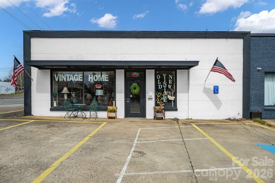 Prime commercial property in rapidly growing downtown Shelby! This corner unit offers excellent visibility and includes 12 dedicated parking spaces for customers. The storefront features a designated office space, while the back of the building provides heated storage. Two bathrooms and an additional unheated area with a separate rear entrance add versatility. Don’t miss your chance to invest before Shelby becomes the next hot spot for business growth! The property is currently vacant.