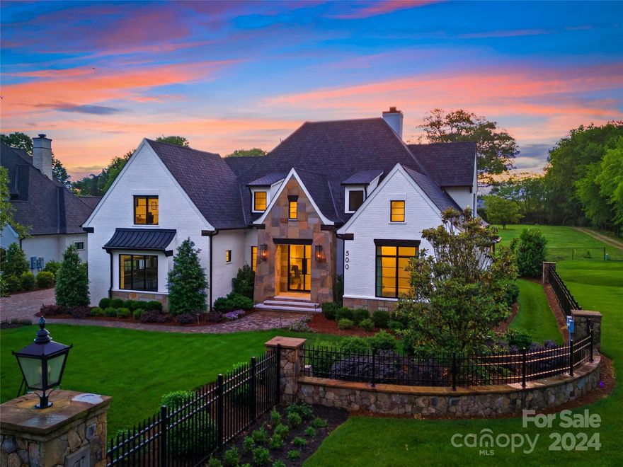 Luxury living at its finest. This move-in-ready modern home sits on a half acre lot in a small gated enclave in the desired Longview Country Club community. Built in 2022 this open concept home is light, airy & inviting. The sky-high ceilings add a dramatic effect & the large windows bring in lots of natural lighting.  The two story great room has a fireplace, views of the backyard & stacking sliding doors which open up to a covered porch, bringing the outside in. A bar area features a beverage refrigerator & easy access to a wine closet.  The gorgeous kitchen has Wolf appliances & large kitchen island with storage under the breakfast bar.  The scullery features a speed oven, extra sink and pantry area.  A drop zone leads out to the two-car garage & a computer nook leads out to the single car garage.  The upstairs media room is large and cozy. Upstairs secondary bedrooms have generous closets.  Second laundry room up. Golf membership required. Minutes to restaurants, shopping and 485.