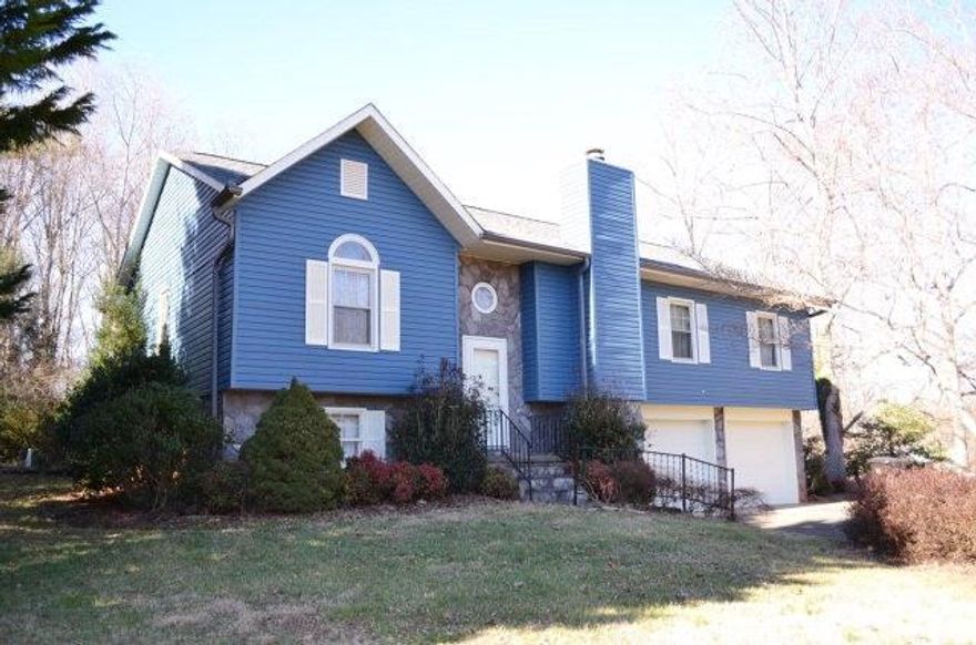 Excellent location! Wonderful 4BR/2BA updated home with fenced in-ground pool in Hermitage East Subdivision, located just between Morganton and Valdese. New in 2014: architectural roof; gutters; siding and pool pump. New heat pump installed in 2013. Spacious open living, dining and kitchen featuring vaulted ceilings. Living room features wood burning stone fireplace and has been freshly painted. Screened porch opens from kitchen/dining and leads to in-ground, fenced pool in private back yard. Split bedroom plan features two large bedrooms sharing a full bath with shower/tub combination in hallway. Gracious master suite features vaulted ceilings, large walk-in closet and full bath with shower/tub combination. Fourth bedroom, additional storage room/office on lower level. Lower level also has 1/2 bath not counted in heated square feet. Double car garage. Numerous decorative perennials, shrubs and trees provide a colorful display in spring/summer. Outbuilding.
