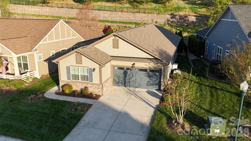 Welcome to 4763 Looking Glass Trail—an exceptional residence where thoughtful upgrades and refined craftsmanship elevate everyday living, nestled within the highly sought-after Trilogy Lake Norman community. Inside, you’ll find custom cabinetry thoughtfully integrated throughout the home, delivering both timeless elegance and exceptional functionality. The stunning chef’s kitchen is a true showpiece, featuring expanded storage, beautifully designed cabinetry, and gorgeous quartz countertops that provide both durability and sophisticated style—perfect for everyday living and effortless entertaining. The den has been transformed into a warm and inviting retreat with newly installed custom built-in shelving and cabinetry, seamlessly paired with a high-end electric fireplace and mantle. This refined focal point creates the perfect ambiance for cozy evenings or hosting guests. Enhanced with 30 brand-new LED lights, the home is bright, energy-efficient, and beautifully illuminated in every room. Step outside to the screened-in patio, where comfort meets versatility. Outfitted with brand-new UV-protectant shades, this serene outdoor space offers privacy while shielding you from wind, pollen, and the elements—allowing you to enjoy North Carolina’s seasons year-round. Ideally located within the community, this home offers convenient walkability to the clubhouse and vibrant entertainment areas, making it easy to enjoy the exceptional lifestyle that Trilogy Lake Norman is known for. Residents have access to resort-style amenities including a state-of-the-art fitness center, pool, walking trails, social clubs, dining options, and a full calendar of activities designed to foster connection and active living. Every detail of this home has been carefully curated to blend style, comfort, and modern convenience—offering a truly elevated lifestyle in one of the Lake Norman area’s premier communities.