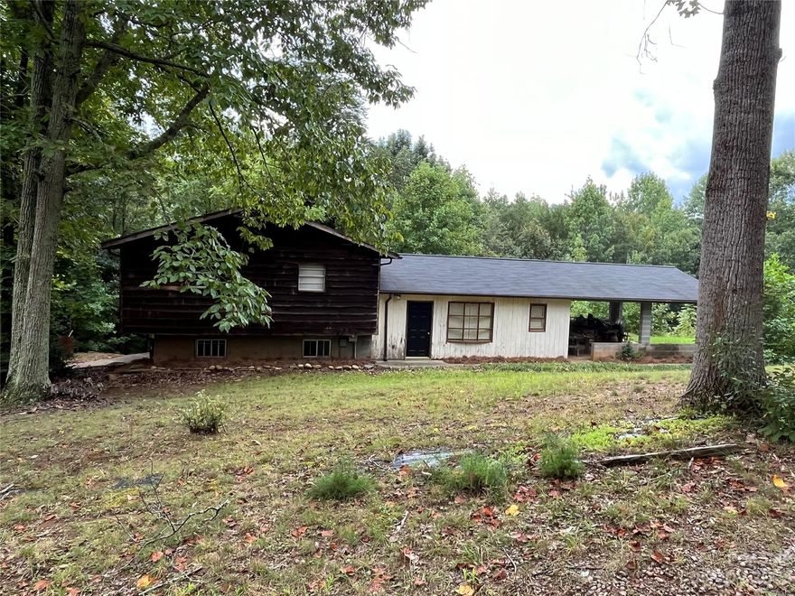 HUGE PRICE REDUCTION! PRICED TO SELL. SECLUDED HOUSE NESTLED ON 3.73 WOODED  ACRES JUST OUTSIDE VALDESE CITY LIMITS ON A PRIVATE DRIVE. NO CITY TAXES! LISTING INCLUDES 2 PARCELS. 1 MILE FROM MAIN ST. VALDESE AND LESS THAN A MILE TO I-40. 15 MINS TO HICKORY AND MORGANTON. 1 HOUR TO ASHEVILLE AND CHARLOTTE. THE HOME HAS 3 BEDROOMS 2.5 BATHROOMS. HUGE LIVING ROOM FOR ENTERTAINING. PRIVATE REAR PATIOS. 2 CAR ATTACHED CARPORT. MULTI- LEVEL 3 CAR DETACHED GARAGE/WORKSHOP ON SEPARATE GENERAL SERVICE METER. PLENTY OF PARKING AVAILABLE. HOME NEEDS SOME WORK AND A LITTLE TLC. SOLD AS IS. SHOWINGS BY APPOINTMENT ONLY. NO DRIVEBYS ALLOWED. !!! 11/17/23 MULTIPLE OFFERS. PLEASE SUBMIT YOUR BEST OFFER BY SATURDAY 11/18/2023 AT 12PM,