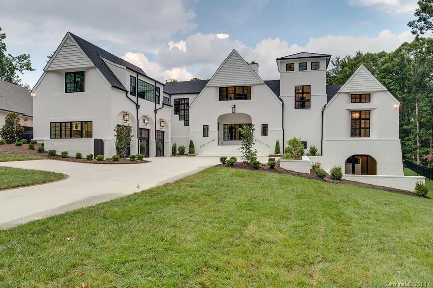 Exquisite contemporary design meticulously built by Grandfather Homes on a private, wooded homesite in Foxcroft. New build features 2 master suites, 1000+ SF of outdoor entertaining space (veranda, grilling porch, exterior zen rm, poolscape & more), fully prewired theater w/ dual level platform, & wine cellar. Stunning interior design work includes intricate ceiling details, luxury trim package, shiplap accents, & custom cabinetry. Kitchen adored w/ custom hood & Thermador appliance package.