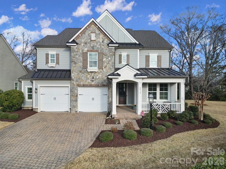 Nestled within the highly sought-after Blakeney Retreat enclave in South Charlotte, this exceptional custom residence by Classica masterfully blends timeless architectural design with superior craftsmanship. Meticulously curated and thoughtfully designed, the home offers an elegant yet functional layout tailored to today’s modern lifestyle, delivering refined living in one of the area’s most prestigious communities. The open-concept living areas are filled with natural light and enhanced by crown molding, Restoration Hardware lighting, and custom 4” plantation shutters throughout. The kitchen is designed for both function and style, featuring a Wolf range, KitchenAid appliances, expansive counter space, a large center island, and a custom walk-in pantry. The primary suite offers a private retreat with a spa-inspired bath and two generously-sized custom closets. Additional living spaces flow seamlessly to the fenced, secluded backyard ideal for relaxing or entertaining. The oversized garage with epoxy flooring provides ample room for parking and storage, with flexibility for a workshop or hobby space. Notable improvements include a complete new HVAC system installed in 2024, a Halo LED whole-house air purification system, Energy Recovery Ventilator (ERV) and a CPI security system. The home's lot adjoins an additional 30,000 square feet (0.7 acres) of 1/7th owned common area land. Convenient walking or biking proximity to Hawk Ridge, Community House, and Ardrey Kell schools adds to the home’s appealing location, along with nearby nature areas and community walking paths. This luxurious home offers a rare blend of high-end finishes, modern systems, and everyday convenience in one of the area’s most sought-after communities. The 2026 HOA dues have been prepaid by the sellers as a courtesy.