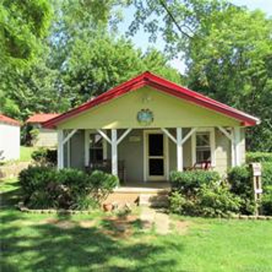 Wonderfully quaint remodeled 1920s bungalow. 2Bdrm/1Bath.  Lots of natural light. Custom floors. Enjoy coffee in the mornings on the covered front porch. Listen to the relaxing sound of the babbling creek that runs along the property. Watch the fireflies in the evening time as you're grilling on the back deck Great for first time home buyers or those folks who want to down size. Convenient to Candler and Asheville but with that country feel.