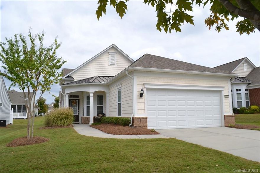 Sun City Carolina Lakes a 55 and older with Amenities galore! This bright and open floorplan home features gleaming wood floors in the great room. Eat in kitchen with Corian counter tops, stainless steel appliances and views into the sunroom. Master suite has a deluxe spa like private bathroom. Spacious secondary bedrooms, one with French doors and wood floors. Great patio out back for relaxing. Home also features an in-ground sprinkler system and all exterior maintenance included.