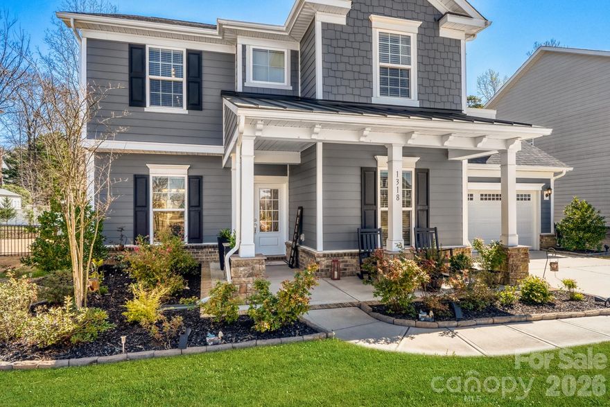Welcome to 1318 Poppy Way, a beautifully upgraded residence in Matthews’ highly desirable Southstone community, where refined design, modern functionality, and everyday comfort come together with ease. Offering four bedrooms, two-and-a-half baths, and over 3,000 heated square feet, this buyer-ready home has been thoughtfully enhanced for effortless living.
A charming front porch and attractive stone accents set the tone, while inside, luxury vinyl flooring flows throughout the home (no carpet), creating a seamless and sophisticated feel. Elegant lighting, decorative ceiling details, and generously scaled rooms elevate the interiors. The main level is designed for both gracious entertaining and comfortable daily living, featuring a formal dining room, a cozy formal living room (piano), and an expansive open-concept living area anchored by a warm corner fireplace.
At the heart of the home, the gourmet kitchen impresses with rich cabinetry, an oversized granite island, new appliances, a gas cooktop, double ovens, a beautifully designed range hood, and a well-appointed butler’s pantry. Just beyond, the breakfast area opens naturally to the living spaces and rear patio, creating an inviting flow for casual gatherings and indoor-outdoor living. A thoughtfully designed drop zone with a built-in office adds convenience for modern routines, while a main-level powder room completes the first floor.
Upstairs, a versatile loft and bonus room provide exceptional flexibility for a media lounge, playroom, or additional workspace. Four spacious bedrooms offer comfortable accommodations, including a serene primary suite designed as a true retreat. The spa-inspired primary bath features a large garden tub, dual vanities, and two oversized walk-in closets. A finished attic space/flex space further enhances the home’s versatility, allowing room to adapt beautifully to changing needs.
Outside, the private backyard is framed by mature trees, offering a peaceful setting to relax or entertain. Additional highlights include an irrigation system, a finished garage with epoxy floors, shelving, and fresh paint, as well as a whole-house water filtration system. Ideally located near I-485, shopping, dining, and everyday conveniences, yet tucked within a quiet neighborhood, 1318 Poppy Way presents an exceptional opportunity to enjoy elevated living in one of Matthews’ most sought-after communities.