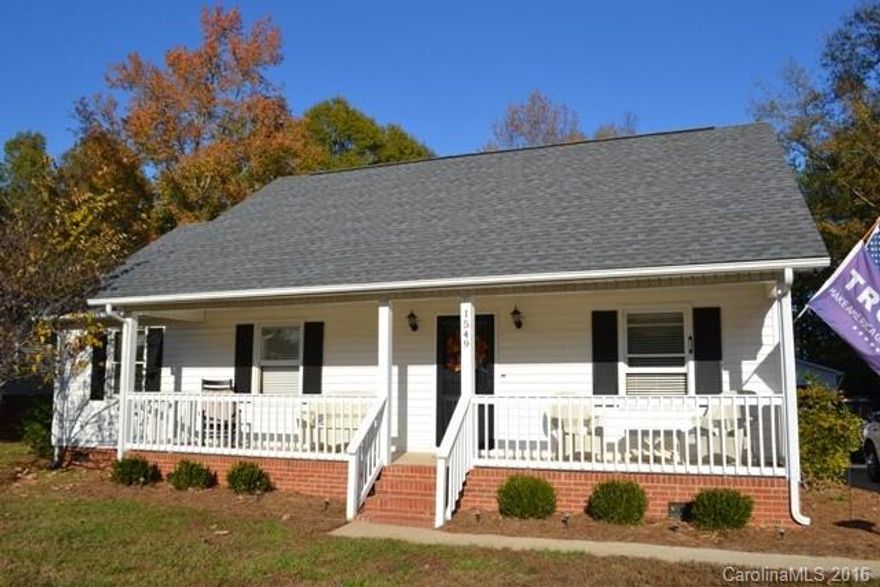 Just reduced! Adorable ranch home on almost an acre!  Split bedroom, lovely hardwoods, and spacious rooms.  Detached 30x38 garage with power.  New roof,  4 yr old HVAC system, ductless air unit, and water heater is only 2 years old. Fenced back yard for private enjoyment!