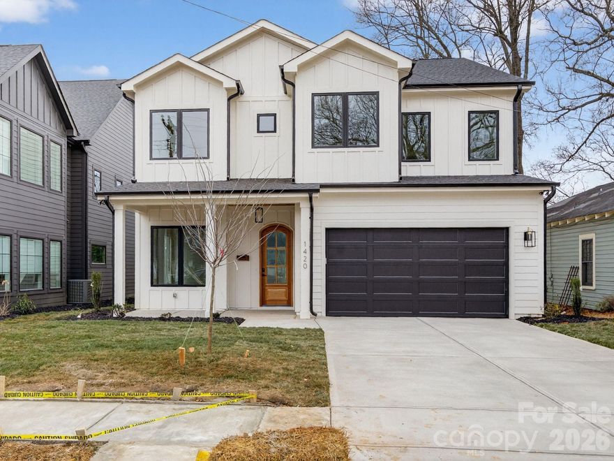 Stunning modern farmhouse in a fantastic location just off The Plaza.  This home is thoughtfully designed with a combination of modern lines, warm wood finishes and satin brass accents.  The heart of this open concept floor plan is a bright and very spacious great room and kitchen, which overlook the covered deck and deep back yard.  The kitchen is a chef's dream, with stainless Jennair appliances, custom cabinetry, quartz countertops and walk-in pantry.  The main level also includes a bedroom with a full bath, plus an office/flex room.  Upstairs, you'll find the Primary bedroom with vaulted ceiling, a spa-inspired Primary bath with a large soaking tub and separate shower, plus two closets - one with washer/dryer hookups for added convenience.  The upper floor also includes three additional bedrooms with ensuite baths and a loft area.  Design details include high ceilings, 8' doors, and wide-plank European White Oak floors.  This home is conveniently located where Villa Heights, NODA and Plaza Midwood meet.  New construction on a tree-lined street, across from 55+ apartment community. Please use caution when touring the home and property, as it is an active construction site.
