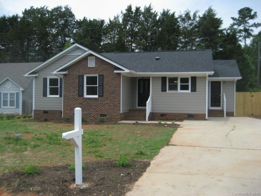 House is better then new! Features new roof, new HVAC system, freshly painted exterior including trim, new laminate flooring, new carpet, fenced in backyard, nicely painted deck and offers an attached storage room!