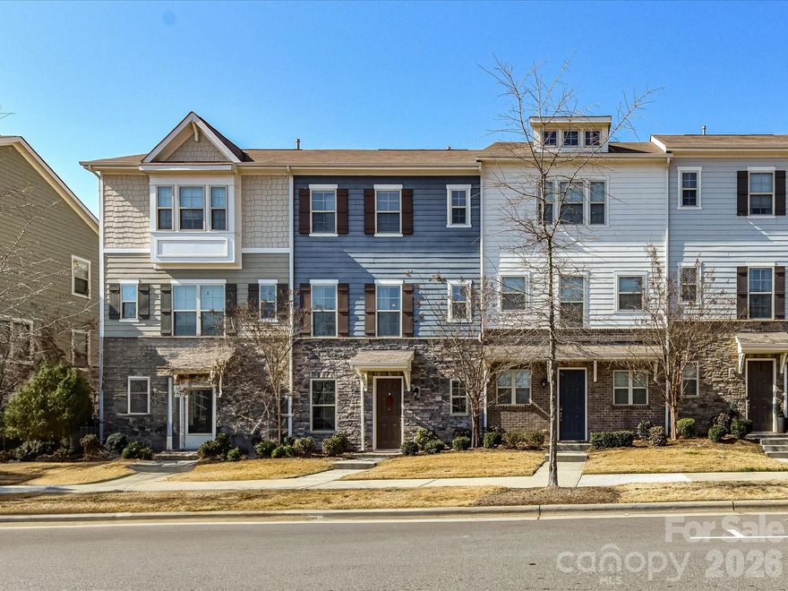 Enjoy low-maintenance living in this three-story townhome with 2 bedroom suites, 2.5 baths, a flexible home office, and a 2-car attached garage with upgraded epoxy flooring. Designed for easy living, the open-concept main level features an island kitchen with 42" gray cabinetry, granite countertops, tile backsplash, stainless steel appliances including a gas range with double ovens, microwave, and walk-in pantry. The kitchen opens to the dining area and great room, creating a comfortable, functional layout.

Community amenities include a resort-style pool with sun shelf, gas grills, cabanas, changing rooms, landscaping & exterior maintenance, as well as dog bag stations. Conveniently located near Arrowood light rail Station, major roadways, shopping and dining. 

Community does have a rental cap that has been met and there is a waitlist.