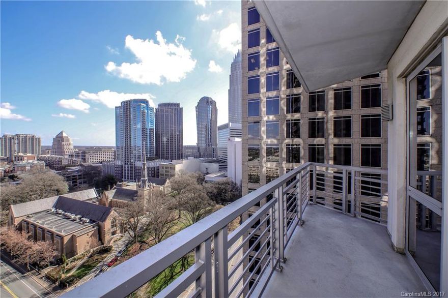 Fabulous high-rise city views await you from this rare two bedroom corner unit. Luxury condo in the heart of uptown with exciting restaurants, shops and entertainment just outside your door. Open layout with gleaming wood floors, granite countertops, stainless steel appliances, covered balcony and floor to ceiling windows. Expansive pool, club room- fitness center overlooks the Panthers Stadium, BB&T Ballpark and Romare Bearden Park. Two parking spaces in garage. Inquire about furnishings.