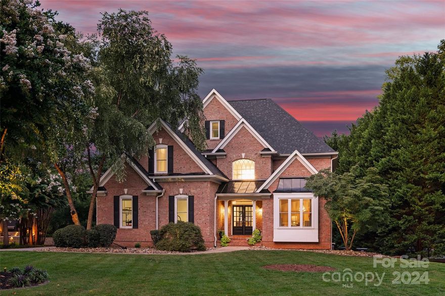 Discover Lake living in this stunning full brick waterfront estate nestled in a community where streets are elegantly lined with gas lanterns. This impressive home spans over 5,200 square feet, offering four levels of sophisticated living space designed to cater to your every need. With seven generously sized bedrooms and 4.5 baths, this home provides ample space for family and guests alike. As you step inside, you'll be captivated by the grand entryway and the seamless flow of the floor plan, perfect for both entertaining and everyday living. endless possibilities, including a lower-level entertainment area, home office, or fitness room. Additional features include a spacious garage, ample storage. Located in a sought-after community, this home combines the best of lakeside living with the convenience of nearby amenities. Don’t miss your chance to own this extraordinary property where every detail has been thoughtfully crafted to create a truly exceptional living experience.