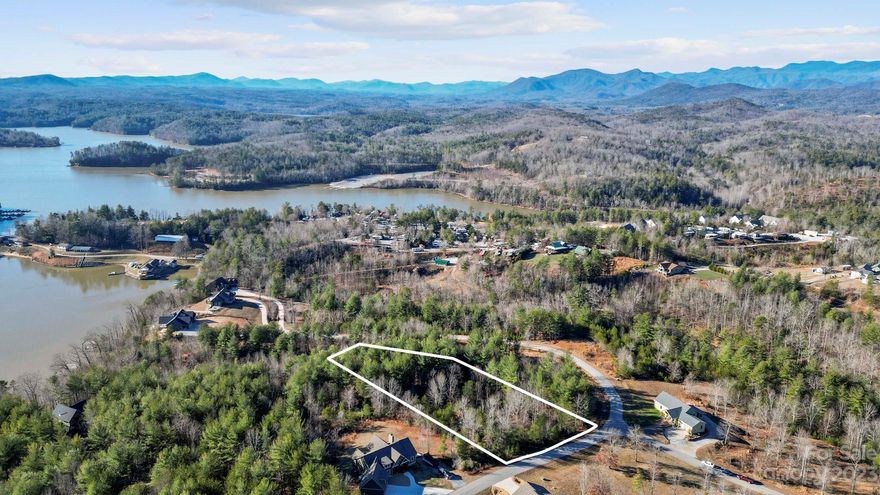 This 1.48 acre property is a hop, skip and a jump from Lake James in Bear Cliff subdivision. With it's prime location, mountain views, lake views, and relative flatness it's the perfect place to build your dream home! Very close to Lake James Marina, restaurant and campground! For more information and restrictive covenants go to: https://bearcliffatlakejames.info/