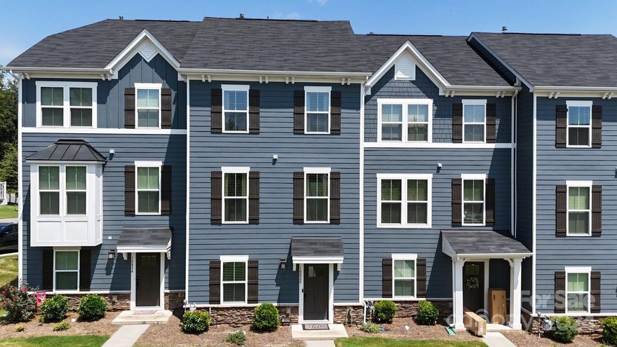 Immaculate, Largest 3-Level Unit plan in this complex (2100sqft). 3-bed, 2.5 bath w attached double car garage built in 2020. Located at Hwy 16 and I-485. Near AIRPORT, Mtn Island Lake, and U.S. White Water Ctr.  Short walk to Shopping/Dining. Enter home on ground level where you are invited into a Flex/Living space thru glass French doors.  Addl. flex/office provided. 2nd level provides OPEN FLOORPLAN btw Kitchen, Family & Dining room. Kitchen boasts a 4-seat Spacious Island, gas stove,  crisp white cabinets w granite countertops along with Butcher's cupboard & Pantry closet. 3rd level-Primary Bedroom w Trey ceiling, walk in closet, en-suite with separate Shower and Soaking Tub w tile floors.   Laundry closet is on 3rd floor along with 2 additional bedrooms and Full Bath.  This upgraded townhome has a Tankless Hot Water System, Luxury Vinyl Flooring, Tile and Carpet.   Washer/Dryer and Refrigerator are included.  Beautiful Home, well taken care of.  Come see and make it your new Home!