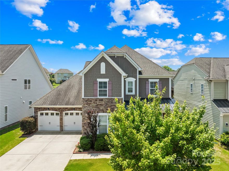 Stunning 5BR/3BA, 3,269 sq ft partial stone-front home in the sought-after Hawks Creek community, zoned for top-rated Fort Mill schools.

Features a welcoming front porch, open-concept main floor with spacious family room and fireplace, large sunroom with French doors and natural light, guest bedroom with full bath, and a gourmet kitchen with white cabinets, granite countertops, gas range, butler’s pantry, and formal dining room.

Upstairs offers a loft, oversized primary suite with garden tub, shower, walk-in closet, plus three additional bedrooms and two full baths, including a hallway bath. Laundry room is conveniently located upstairs.

Enjoy a private backyard with trees and neighbor fencing. Washer, dryer, and refrigerator included.

Community amenities include a pool and cabana. Convenient to Gold Hill Rd, Hwy 160, Harris Teeter, and I-77.
