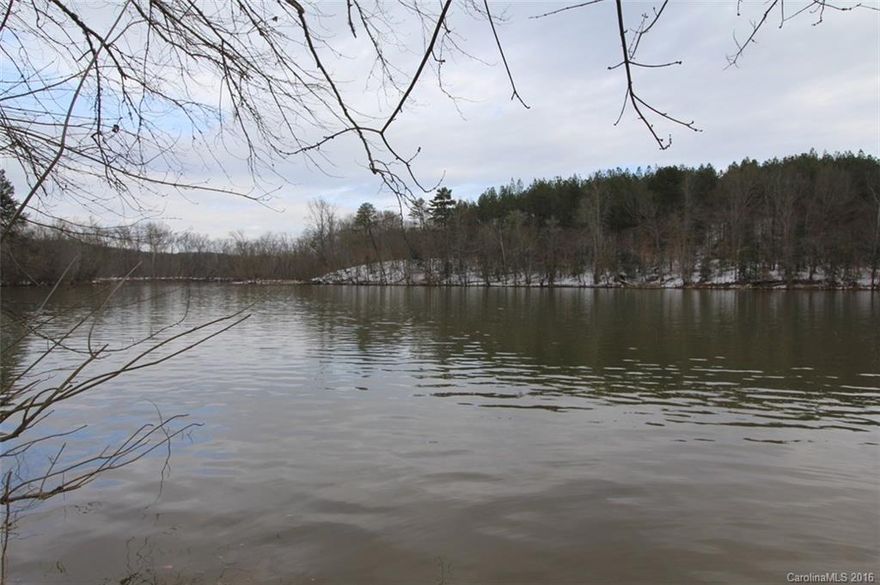 590+/- Acres on Lake Rhodhiss in Burke County. Tract has shoreline footage, mature timber, and rolling topography. There is already an excellent interior road system established. The timber is a mix of hardwood and pine . Excellent hunting opportunities including deer, bear, turkey, waterfowl and other small game. This parcel is a portion of a larger parcel. Multiple Parcels also available. Exact acreage subject to survey. Property to be transferred via Special Warranty Deed at closing.