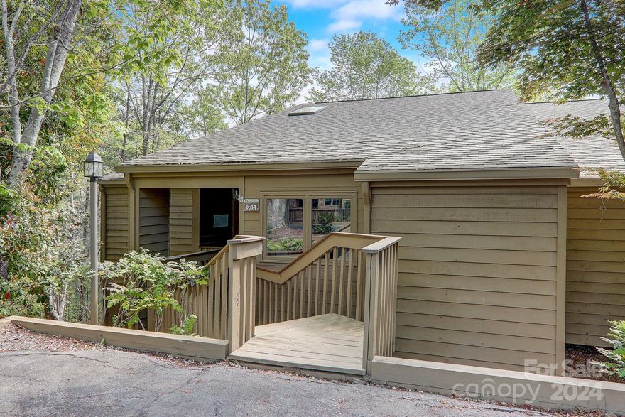 Impeccably kept, rare to come by 3 bedroom,3 bathroom Quail Cove unit inside gates of Rumbling Bald! This end unit has full late fall, winter and early spring views of Lake Lure and peek-a-boo views in summer at full bloom. Enter this split level unit to open foyer with skylight, two large bedrooms and two updated bathrooms with radiant heated floors . Take the short flight of stairs to main level living room, dining area with gas fireplace and open to large kitchen with pantry. French doors on either side of the fireplace take you to relax outside on the deck. From foyer, go down stairs past laundry room to the large primary bedroom with private balcony, owners storage closet, regular closet and full bathroom. This unit is located just a walk, golf cart or car ride away from all the amenities Rumbling Bald has to offer-beach, golf, wellness, tennis, pickleball, spa, indoor/outdoor pools and more. Check  community website for details. Don't miss this rare opportunity!