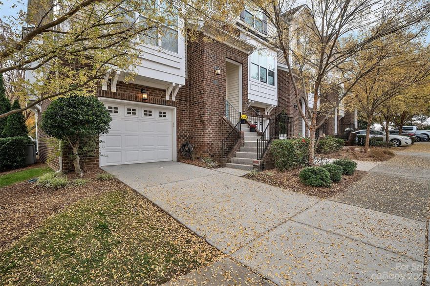 This gorgeous, end-unit townhome has over 2300 SF of comfortable living space! Start with the main floor living room or office, and a large great room with a cozy fireplace, wood floors, wainscoting and molding. The kitchen features contemporary finishes to appeal to today's modern preferences, with lots of storage, granite, and tile backsplash. Transition outdoors to a covered patio and covered deck for all of your entertainment and relaxation needs. Upper level has a spacious primary BR with trey ceiling and closet with built-ins. The bath features granite countertops, garden tub, dual vanities and walk-in shower. 2 additional BRs, another full bath, and laundry complete the upper level. But wait, there’s more! The lower floor boasts a 4th bedroom and full bathroom.  Within walking distance of the optional amenities offered in the community. Very convenient to shopping, fine dining and interstates.