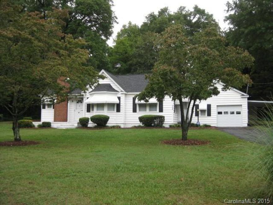 Nicely maintained home with many updates, including roof, windows, carpet, laminate flooring, fresh paint, plumbing & electrical.  Nice home ready to move in.  Large rooms throughout and a huge yard with loads of privacy.  Current office could be 3rd bedroom.  Large storage area in back of garage.  A fabulous home for the price. Convenient to both I85 and 321 for commuting in any direction.