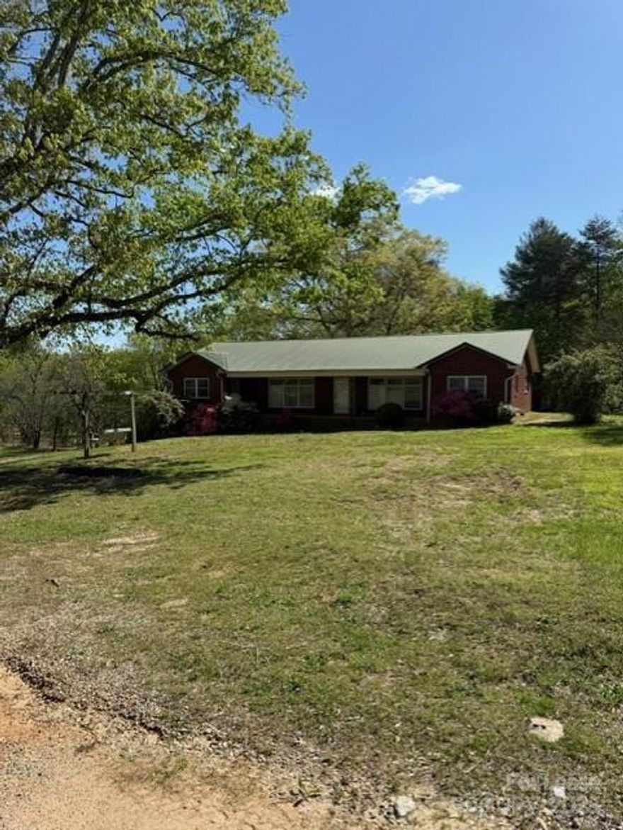 VERY LARGE HOME IN GRANITE FALLS!!!  This 4 BR 2 full BA home with a bonus room.  Large eat in kitchen and dining room.  Nice size bedrooms and a full basement with plenty of storage room.  2 car garage in basement.  Nice large lot.  You must see to appreciate the space this home has.