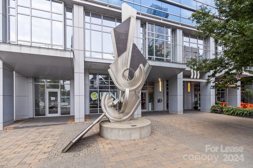 Spectacular views and fantastic location in Uptown Charlotte! This spacious 2 bed, 2 bath condo has everything you have been looking for. The living room and master bedroom feature floor to ceiling windows with wonderful views of the city. Modern kitchen boasts stainless steel appliances, gleaming granite counters, custom tile backsplash, eat-in center island, and great entertaining flow into the living room. Both bedrooms are spacious and have new carpet and a walk-in closet as well as a full bath with modern fixtures.