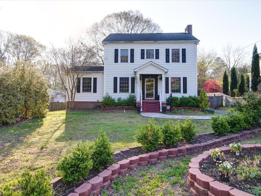 Look no further than this beautiful colonial in Brookwood Historic District. Gourmet kitchen features include: gas range, breakfast bar island, glass front cabinetry, under cabinet lighting & a charming window seat! Handsome hardwood floors. Spacious living room with extravagant moldings & fireplace mantel.  Laundry room with cabinetry & pantry closet. Recently updated bathrooms.  Walk-out basement finished as recreation room has large storage closet & utility room access.  A terrific getaway space! Spa like bathroom with whirlpool tub and separate shower. Screened in porch overlooks large fenced backyard with storage building.  Additional basement area with outside entry ideal for storing yard accessories or potential workshop.  Near downtown amenities and FUSE District. Seller represents Rheem AC and Furnace installed 4/2019 and 30 year architectural shingles installed 2009.  Additional information about Brookwood Historic District available at City of Gastonia Planning Dept.