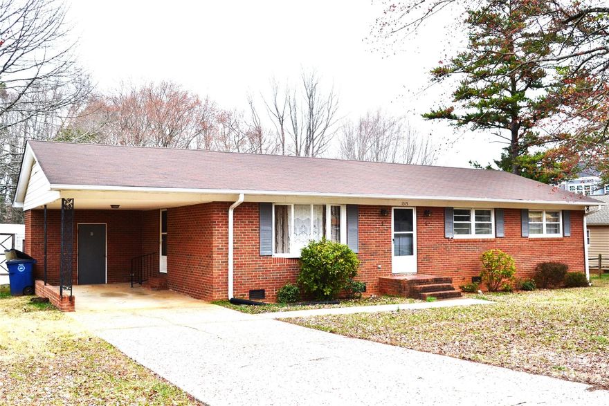 Come update this beauty for a lovely home in a great location!  Large back yard with shed and level lot.  House does need TLC which is reflected in the price. Great house for investors! Laundry is located in the room at the back of the carport. Attic has blown in insulation and the insulated attic cap at the top of the pull down stairs. So much that could be done to turn this sturdy house into a beautiful home! Sold As-Is.