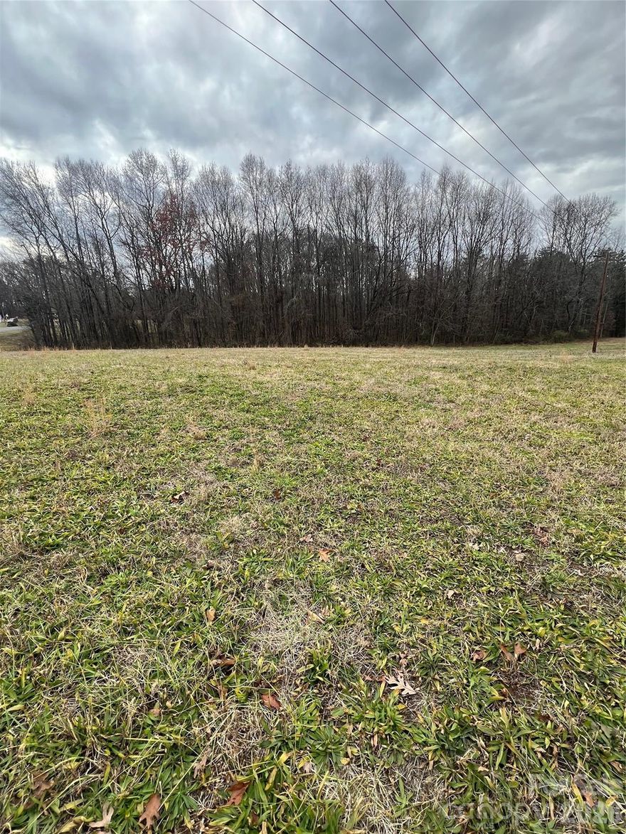 Expansive 15-acre tract located in eastern Rowan County, offering the perfect setting to build your dream home. An adjoining parcel is also available, providing the opportunity to purchase a total of 18 acres. The property features a desirable mix of partially wooded and partially cleared land, along with a pond. A Duke Power utility easement is in place for power lines. Initial soil evaluation has been performed.