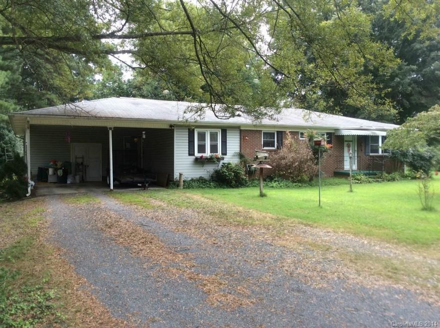 4bd/2.5ba home, some hardwood floors, den, fireplace in living room, outbuilding, patio, attached double carport, detached single car garage,  quiet neighborhood, but convenient to shopping, dining & I-85!  SOLD AS IS.