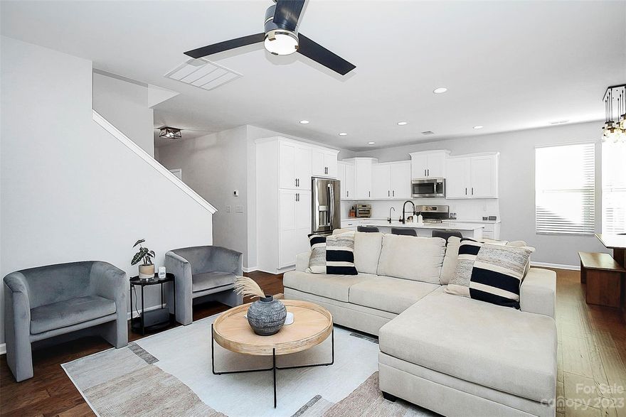 Seller offering a credit for 2-years of HOA dues with acceptable offer! Stunning and meticulously maintained, this rare 2020 build in Monteith Park is a gem! ROOF, SIDING, LANDSCAPING, AND MORE INCLUDED IN HOA! This home has it all from an open kitchen boasting quartz countertops, white tile backsplash a reverse osmosis water system and stainless steel appliances, to incredibly sleek bathrooms with features such as a double quartz vanity tile shower, and walk-in closet in the primary. This home has two bedrooms down including the primary suite, a fenced patio, and a ton of modern finishes throughout.  No carpet on the main floor! The second level features a spacious loft and two more large bedrooms as well as a full bath.   The community pool and walking trails are just a short walk away. Minutes from great shops, entertainment, and restaurants, plus proximity to I-77 makes commuting a breeze.  Kitchen refrigerator conveys.  *0.5% borrower credit with use of preferred lender.*