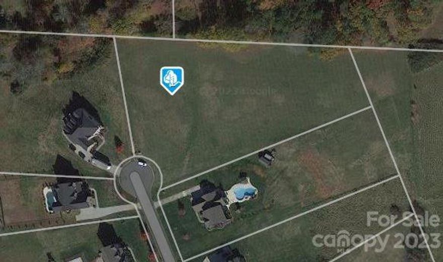 This large cul-de-sac lot in gated Castlebrook Farms is waiting for you to build your dream home!! The lot is flat and features 2.62 acres that is convenient to I-85, shopping, and restaurants!

Previous owners had 4 BR perc test approved in 2007, but current owner had soil engineer do a report and found that it currently does not perc for a traditional system. Engineer and soil scientist recommend a Surface Drip system for this site.