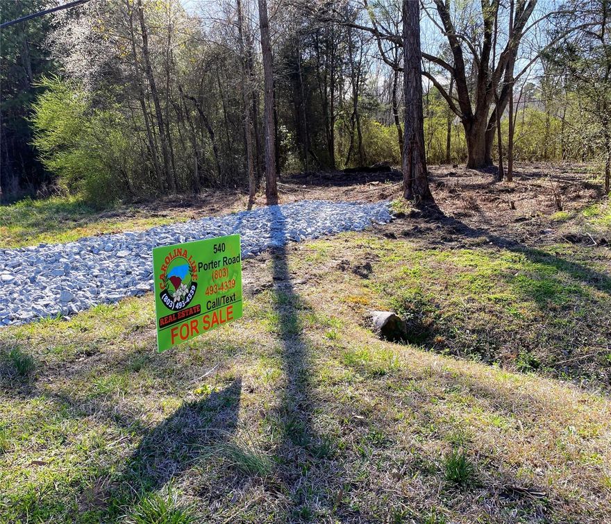 Zoned SF-3, Manufactured/Modular homes allowed.  No mobile homes.  

Nice cleared lot on Porter Road in a rapidly growing area of Rock Hill, SC. Minutes from I-77 and/or down town Rock Hill. The closest exit off of I-77 is Exit 75, or Exit 77.  The lot is a corner lot facing porter road of the formerly developed Rock Grove Park subdivision.  There are none or very limited private/public restrictions above and beyond Rock Hill City restrictions.  Please check with city Planning & Development for any specific detailed questions regarding the lot.  City water and sewer available through Rock Hill Utilities.