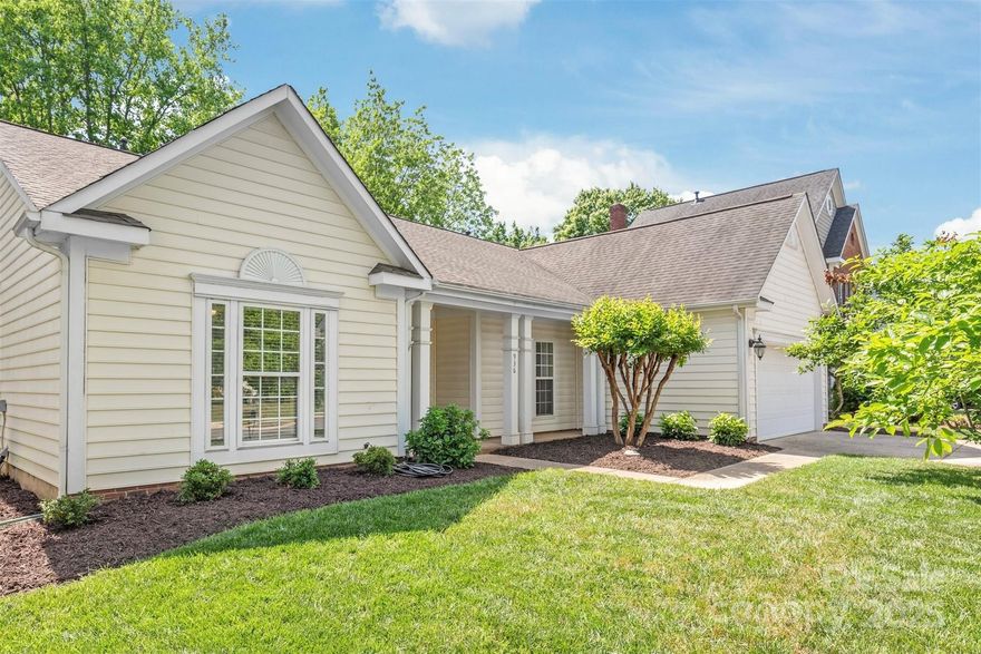 Nestled in one of Fort Mill’s most sought-after neighborhoods and located within the award-winning Fort Mill School District, this charming ranch offers a lifestyle that’s hard to find. From the moment you step onto the welcoming front porch, you’ll feel it: this is a place where memories are made. Inside, you'll find tall ceilings, abundant natural light, and thoughtful custom touches throughout—including luxury vinyl floors, custom trimwork, designer lighting, fixtures, updated door hardware and plumbing (2017) for added peace of mind. The primary suite is a true escape, featuring 2 walk-in closets and a fully renovated ensuite with freestanding soaking tub and frameless shower that feels like your own private spa. Down the hall, the second full bath is just as impressive, with custom finishes and beautiful trimwork. Step outside into your private backyard sanctuary, surrounded by mature trees and a fenced yard—perfect for morning coffee or simply soaking in the peace and quiet.