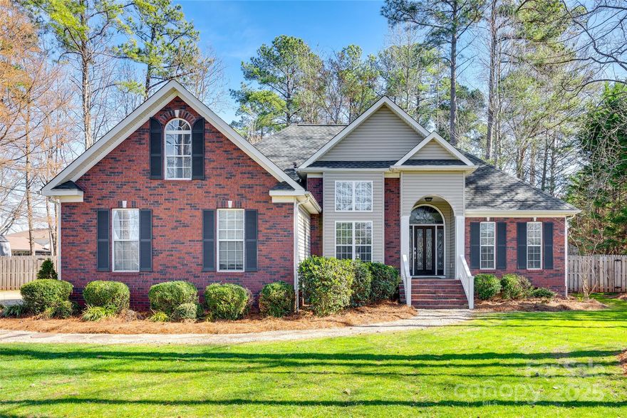 Welcome to this beautifully updated single-family ranch with an upstairs flex room, nestled on a spacious 0.44-acre lot with no HOA restrictions! Boasting 1,898 square feet, this home features bamboo stranded wood floors throughout, adding warmth and elegance to every room.

The remodeled bathrooms include a luxurious soaking tub in the primary suite, while the quartz countertops and abundant kitchen storage make cooking a breeze. Relax in the inviting living room with a stunning shiplap fireplace, or entertain guests at the wet bar.

Step outside to enjoy the covered back deck and private fenced-in yard, complete with a patio perfect for a firepit and a storage shed. Green thumbs will love the raised garden beds, ideal for growing your own produce. Thoughtful details like crown molding throughout enhance the home's charm and character.

Don’t miss out on this move-in-ready gem—schedule a showing today!