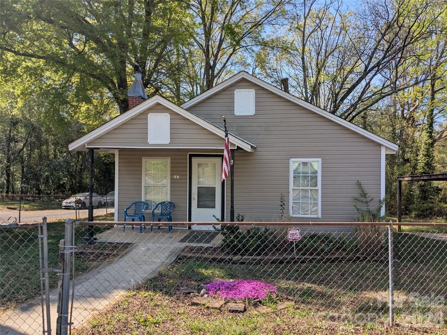 Beautiful remodeled home.  New paint, new carpet, appliances include refrigerator with ice maker and new washer and dryer.  Carport and fenced yard.  Enjoy sitting on your covered porch of visits to nearby up town restaurants.  Hurry on this one.