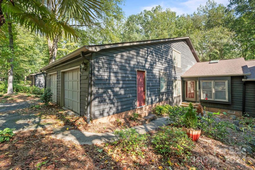 Beautifuylly Updated and lovingly maintained unit nestled in a quiet and peaceful community.  Enjoy the privacy from the deck and mature landscaping.  Primary bedroom with updated  en-suite bathoom opens up to an all season room.  2 Full Bedrooms on the Main and Bed/Bonus with full Bathroom upstairs.  One Car garage with 2 spaces to park in driveway.  Kitchen has stainless steel appliances and granite counter tops, Gas stove and gas heat.  Bathrooms are tiled and updated.  Hardwood floors in the living areas.  Furnace replaced in 2020.  Roof in 2016. Walk in attic storage.  Close to Great Amenities and major roads.  Nothing left to do but move in!