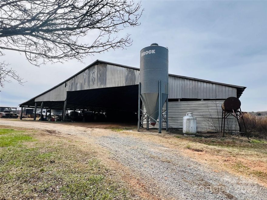 Dreaming of large acreage to make your own homestead? Here is your chance with 87+ acres of prime land consisting of a 98'x236' pole shed barn with 36'x46' cinderblock building attached, pasture, and woodlands. There are small creeks that run both in front and rear of the land. A nice building spot on the tall knoll in middle of property has views of mountains in the distance and views of neighboring forest covered hills. Given this was once a dairy farm, you could raise cattle/horses on the accompanying pastures. Abundant wildlife on property such as deer, rabbit and squirrel. Only minutes from Hickory/Newton/Maiden with close proximity to I-40, Hwy 321 & Hwy 10. An additional 37+ acres (which make up the 124+ total acres of property) in back portion of land is currently under lease as a solar farm and will be deeded off from the rest at time of closing.