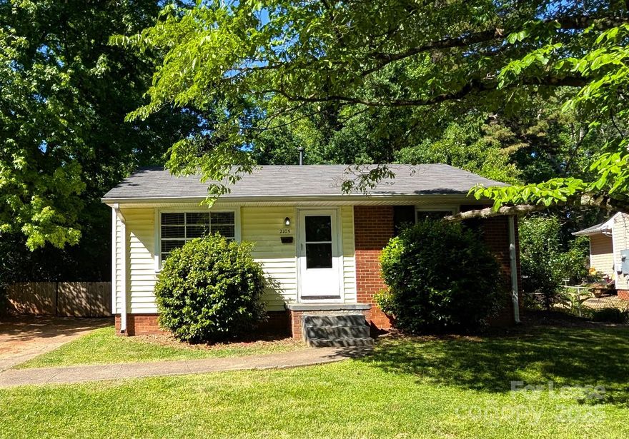 Beautifully updated 2 bdrm 1 bath 744 SF single family home in convenient Eastwood Acres w easy access to NoDa and Uptown. Kitchen has granite countertops, white cabinets, tile backsplash, stainless steel appliances and tile floor. Updated bathroom includes tile shower surround and floor. Breakfast nook w lots of light overlooks private -fenced in - back yard with lots of shade trees. Large living room. Stacked washer/dryer.