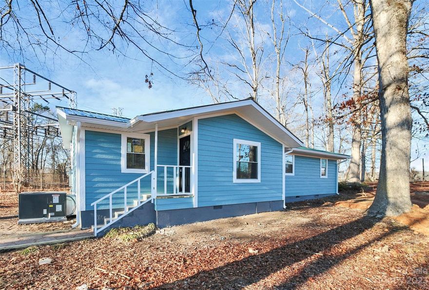 Updated home in a quiet country setting. New septic tank (county approval docs uploaded), new siding (engineered wood), foundational work (county permit uploaded), new heat pump (permit & unit info attached - 5 yr product warranty), electrical service upgrade (county permit attached), new countertops, new flooring throughout (vinyl plank), new paint throughout, new shower/toilet/sink, all new windows & relatively new metal roof. Survey uploaded. There is a well on the property that hasn't been tested since the home now is connected to the county water.  Showings start Saturday, 2/10.