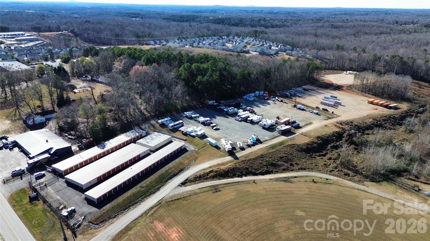 Positioned in the heart of one of Lincoln County’s fastest-growing corridors, Guardian 1 and Guardian 2 present a rare opportunity to acquire 2 high-demand indoor/outdoor storage facilities in Denver, North Carolina. The properties are located at 1440 N NC 16 Business Hwy, Denver, NC 28037 and 2585 N NC 16 Business Hwy, Denver, NC 28037, offering excellent visibility and accessibility along a major thoroughfare.

Denver, NC continues to experience strong population growth due to its proximity to Lake Norman, Charlotte, and major employment centers. This growth is further supported by over 6,000 residential homes already approved within the immediate vicinity, driving sustained demand for personal and commercial storage solutions.

The facilities are well-suited for a broad range of uses, including boat and RV storage, contractor and trades equipment, vehicles, and household goods. Flexible unit configurations and outdoor storage options appeal to homeowners, small businesses, tradespeople, and recreational users alike.

Self-storage remains a recession-resistant asset class with low operating expenses, minimal staffing requirements, and strong cash flow potential. The surrounding residential expansion, combined with the properties’ strategic location, enhances long-term value and offers scalability through future expansion or optimization.

Denver’s blend of small-town charm and rapid development makes this an ideal investment market—where accessibility, growth, and consistent demand intersect for stable income and future upside.