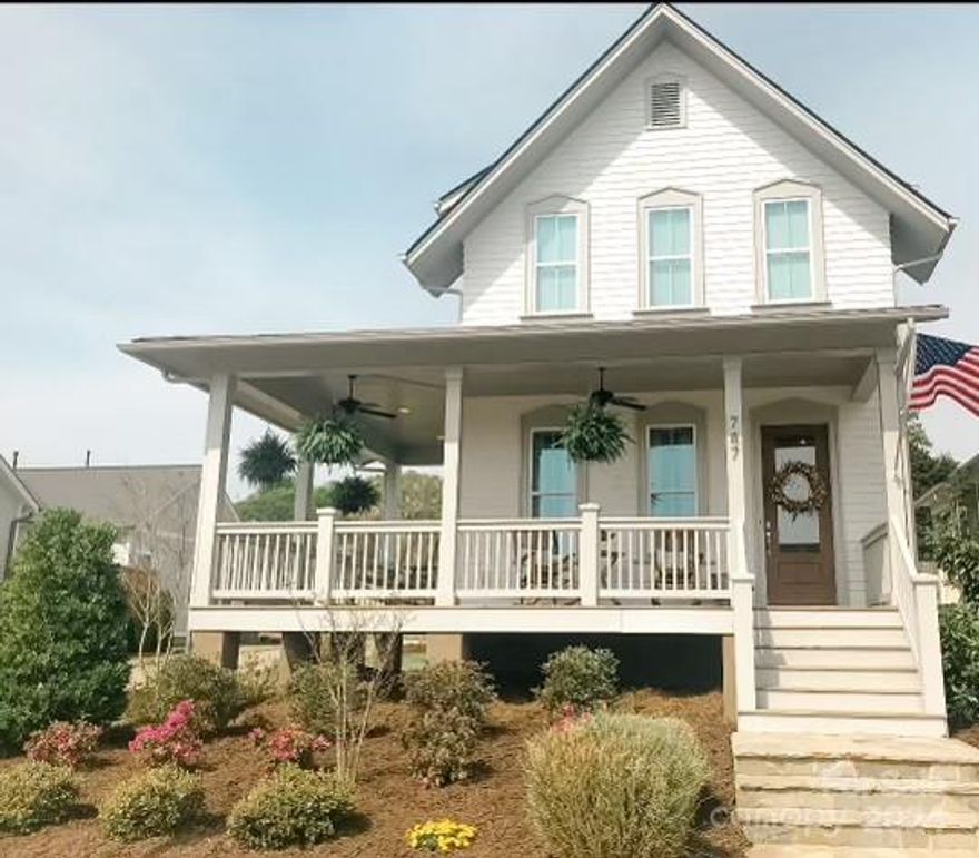 Come home to the immaculate 3 bedroom/2.5 bath home that sits on a corner lot with a big beautiful Rocking Chair front porch that wraps around the whole side.  The two car garage is detached located behind the home.  There is an Open floor plan with a large island featuring quartz.  Stainless steel appliances and site finished hardwood floors. Beautiful board and baton on the main floor.  Large shower in the primary bath !!  Location, location on this one !!! Walking distance to the community pool and playground.  A short golfcart ride to dining and storefront.  Enjoy the backyard and back covered porch after a long day at the office.  Come take a look for yourself to see if your would love this home is in this Unique Community !!